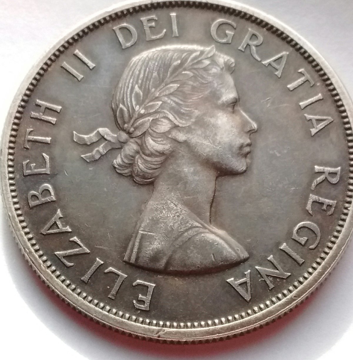 Can-You-Please-Grade-My-Toned?-1959-Canada-One-Dollar?